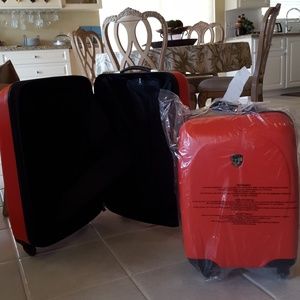 Two matching hard suitcases